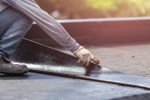 Professional Basement Waterproofing technician working in New London, MN